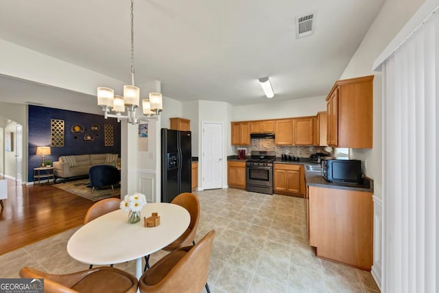 1936 Lakeshore Overlook Cir NW, Kennesaw, GA 30152 - dining space with a chandelier