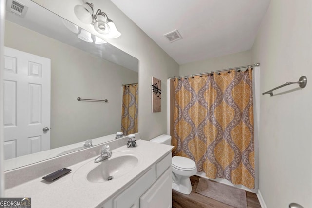 1936 Lakeshore Overlook Cir NW, Kennesaw, GA 30152 - bathroom featuring vanity, wood finished floors, and curtained shower