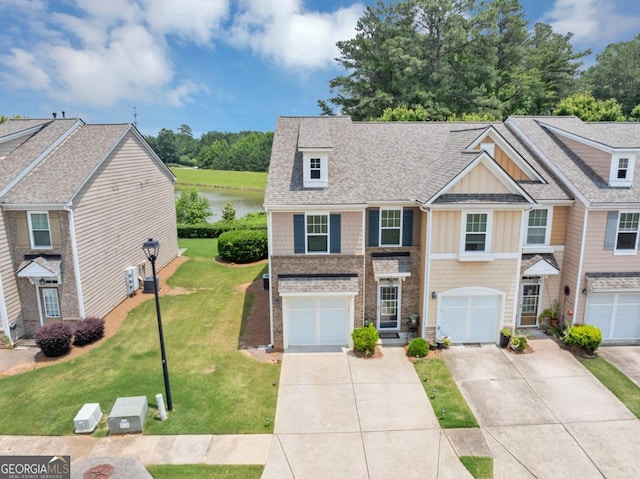 1936 Lakeshore Overlook Cir NW, Kennesaw, GA 30152 - multi unit property with driveway, a water view, board and batten siding, roof with shingles, and a front lawn