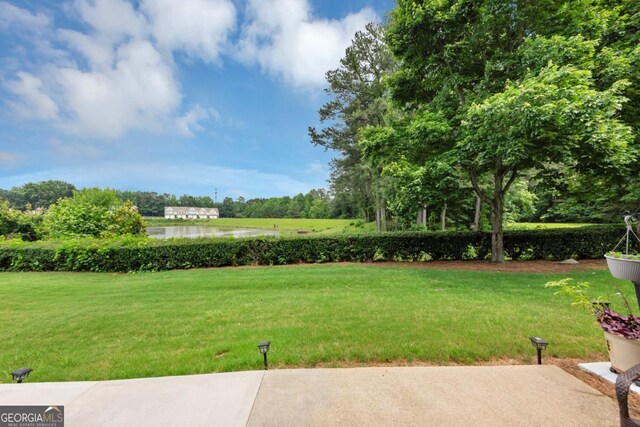 1936 Lakeshore Overlook Cir NW, Kennesaw, GA 30152 - view of green lawn with a water view