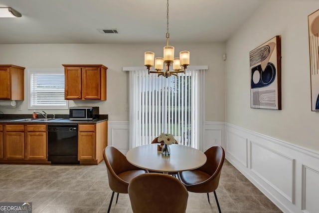 1936 Lakeshore Overlook Cir NW, Kennesaw, GA 30152 - dining room featuring a chandelier, a decorative wall, a wainscoted wall, and light tile patterned flooring