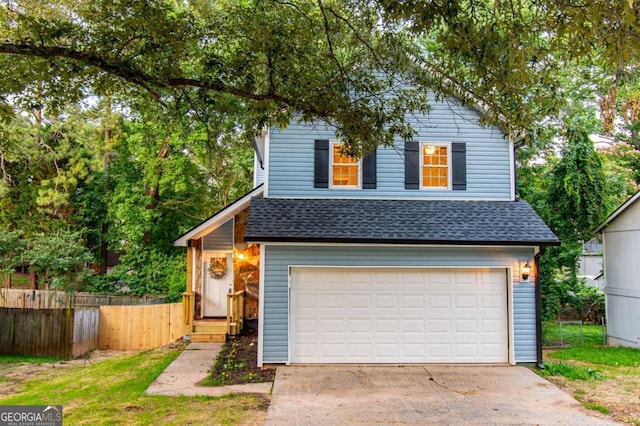 909 Shiloh Ridge Run NW, Kennesaw, GA 30144 - traditional home with roof with shingles, a garage, and concrete driveway