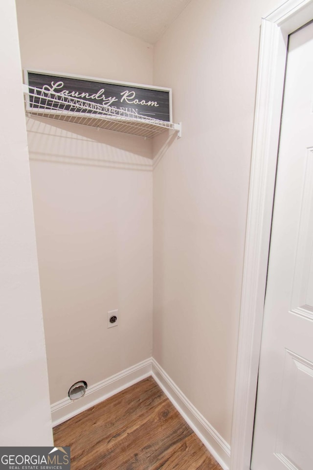 909 Shiloh Ridge Run NW, Kennesaw, GA 30144 - laundry room featuring wood finished floors and electric dryer hookup