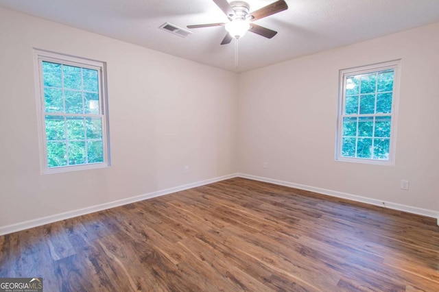 909 Shiloh Ridge Run NW, Kennesaw, GA 30144 - spare room with wood finished floors and a ceiling fan