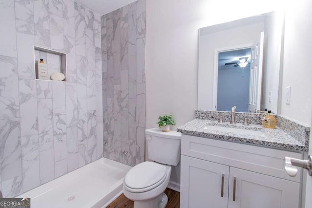 909 Shiloh Ridge Run NW, Kennesaw, GA 30144 - bathroom with vanity, a shower, and ceiling fan