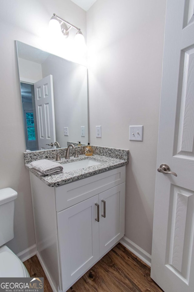 909 Shiloh Ridge Run NW, Kennesaw, GA 30144 - half bath with vanity and wood finished floors