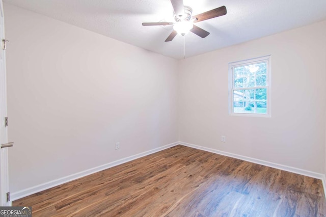 909 Shiloh Ridge Run NW, Kennesaw, GA 30144 - unfurnished room with wood finished floors and a ceiling fan