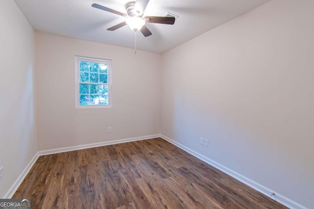 909 Shiloh Ridge Run NW, Kennesaw, GA 30144 - unfurnished room with dark wood-style flooring and ceiling fan