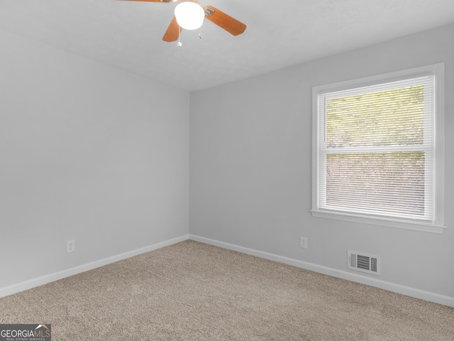 4720 Hull Rd SE, Conyers, GA 30094 - unfurnished room with carpet flooring and a ceiling fan