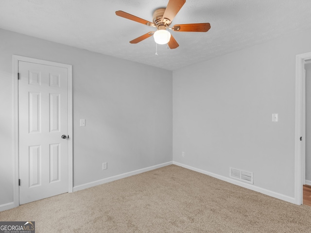 4720 Hull Rd SE, Conyers, GA 30094 - empty room featuring ceiling fan and carpet flooring