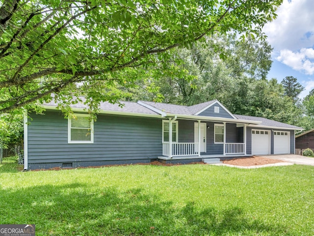 4720 Hull Rd SE, Conyers, GA 30094 - ranch-style home featuring covered porch, a garage, a front yard, and driveway