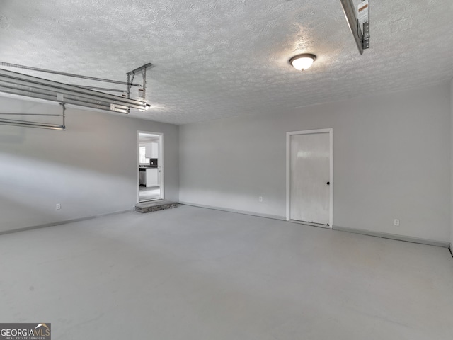 4720 Hull Rd SE, Conyers, GA 30094 - garage featuring baseboards