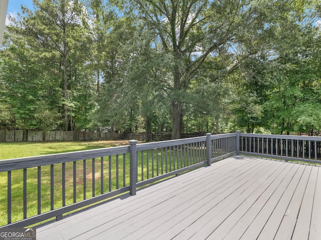 4720 Hull Rd SE, Conyers, GA 30094 - wooden terrace featuring a fenced backyard and view of wooded area