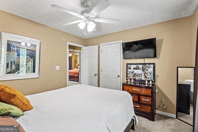 47 Powder Springs St, Hiram, GA 30141 - carpeted bedroom with baseboards and ceiling fan