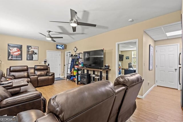 47 Powder Springs St, Hiram, GA 30141 - living area featuring light wood finished floors and a ceiling fan