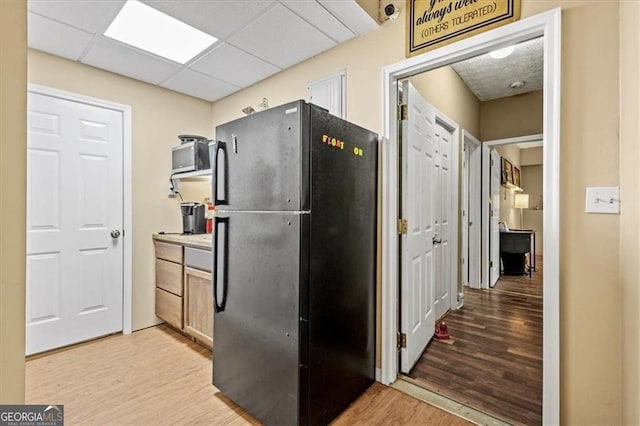 47 Powder Springs St, Hiram, GA 30141 - kitchen featuring freestanding refrigerator and light wood-style floors