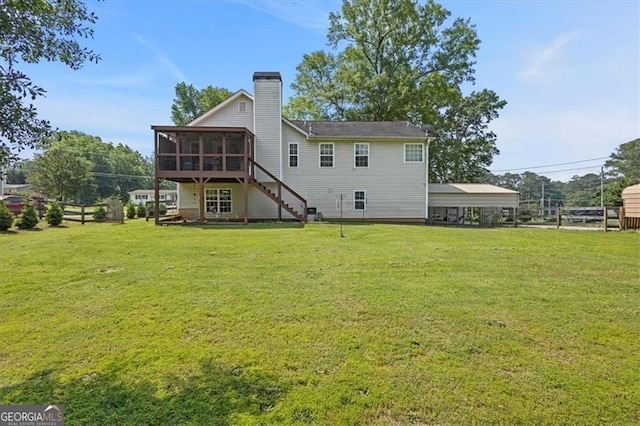 47 Powder Springs St, Hiram, GA 30141 - rear view of property featuring a sunroom, a yard, stairs, a chimney, and a carport