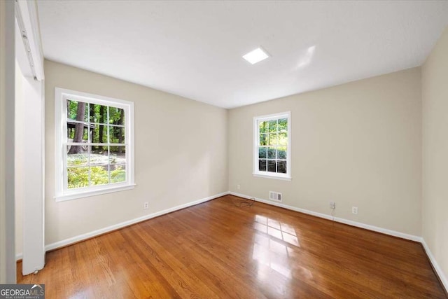 2179 Mountclaire Ct, Stone Mountain, GA 30087 - unfurnished room with wood finished floors and baseboards