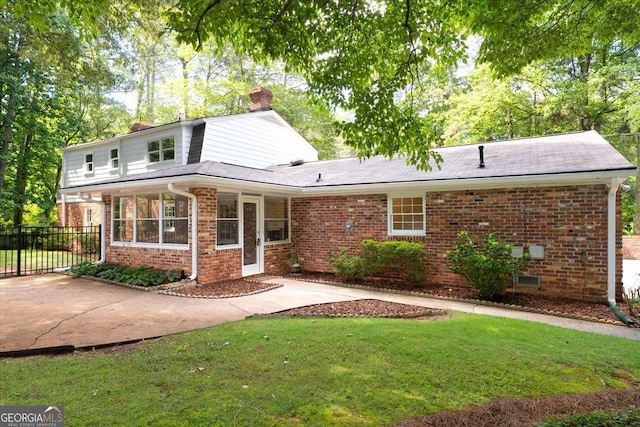 2179 Mountclaire Ct, Stone Mountain, GA 30087 - view of front of property featuring brick siding and a chimney