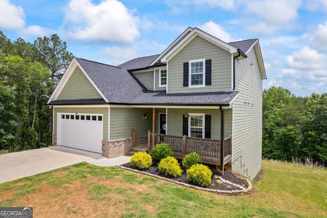 6422 Woodland Station Dr, Lula, GA 30554 - view of front of house with a porch, an attached garage, a front yard, concrete driveway, and a shingled roof