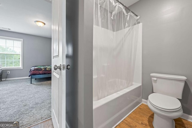 6422 Woodland Station Dr, Lula, GA 30554 - ensuite bathroom featuring baseboards and shower / tub combo with curtain