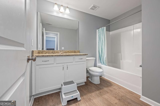 6422 Woodland Station Dr, Lula, GA 30554 - bathroom featuring vanity, wood finished floors, and shower / bathtub combination with curtain
