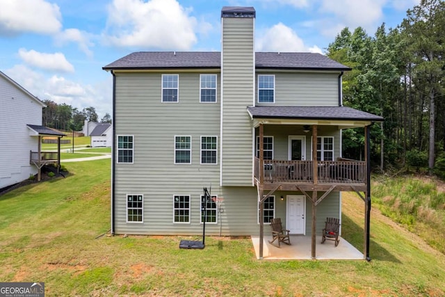 6422 Woodland Station Dr, Lula, GA 30554 - back of property featuring a patio area, a yard, a chimney, and ceiling fan
