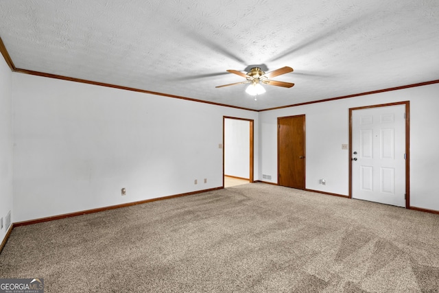 23-25 Sentry Oak Ct, Stockbridge, GA 30281 - unfurnished bedroom featuring carpet floors, ornamental molding, a textured ceiling, and a ceiling fan