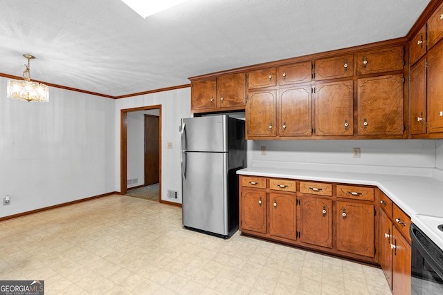 23-25 Sentry Oak Ct, Stockbridge, GA 30281 - kitchen with freestanding refrigerator, light flooring, a chandelier, light countertops, and brown cabinetry