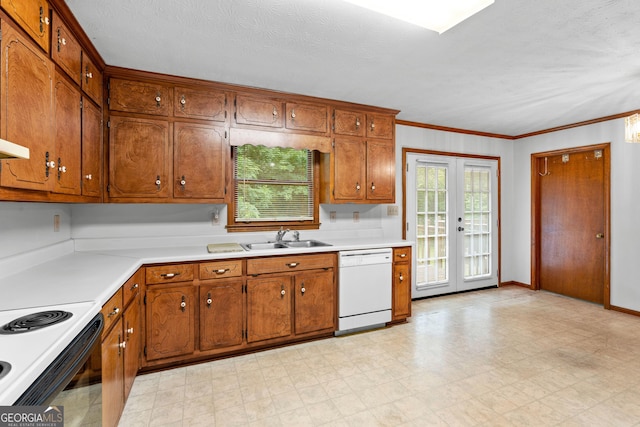 23-25 Sentry Oak Ct, Stockbridge, GA 30281 - kitchen featuring dishwasher, brown cabinetry, light countertops, light floors, and ornamental molding