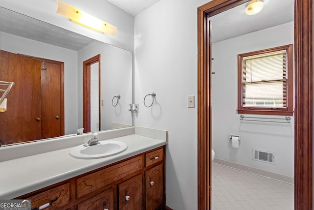 23-25 Sentry Oak Ct, Stockbridge, GA 30281 - bathroom with toilet and vanity