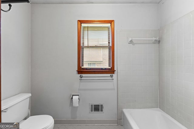 23-25 Sentry Oak Ct, Stockbridge, GA 30281 - full bathroom with toilet and tile patterned flooring