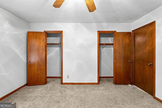 23-25 Sentry Oak Ct, Stockbridge, GA 30281 - unfurnished bedroom featuring carpet floors and ceiling fan