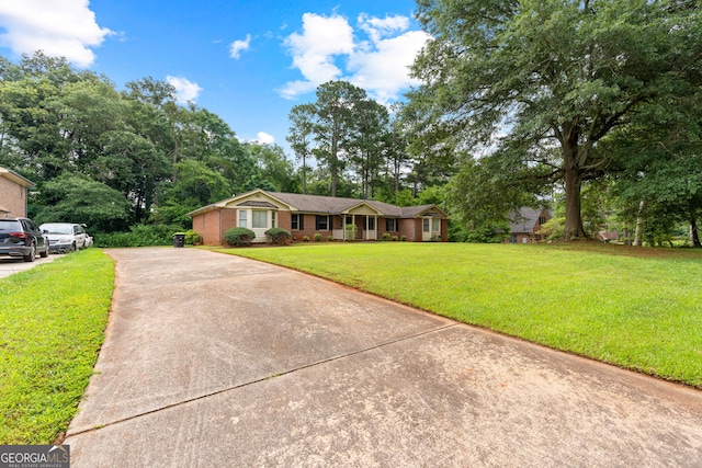 23-25 Sentry Oak Ct, Stockbridge, GA 30281 - ranch-style house with driveway and a front yard
