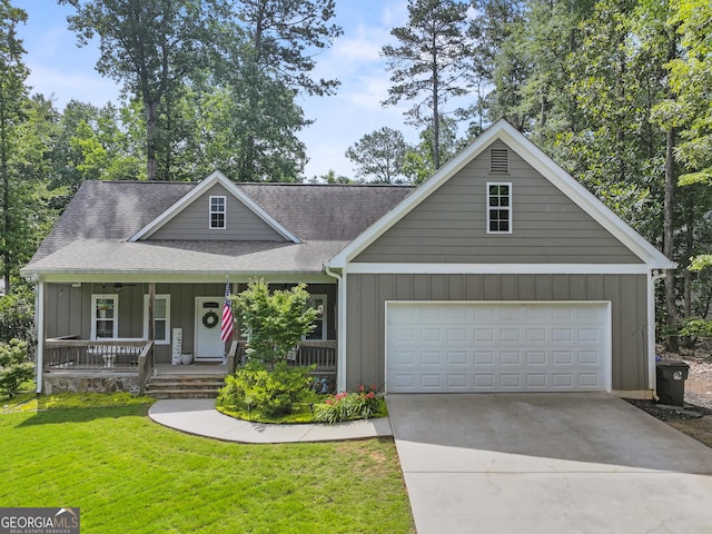 105 Crestview Dr, Jefferson, GA 30549 - view of front of house featuring a porch, board and batten siding, driveway, a front yard, and an attached garage