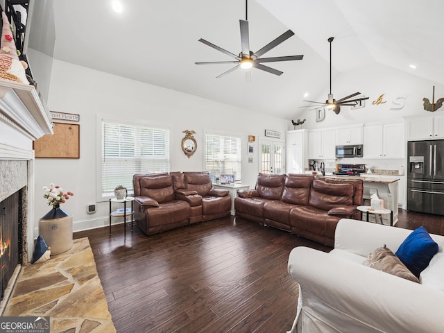 105 Crestview Dr, Jefferson, GA 30549 - living area with a ceiling fan, a high end fireplace, dark wood-style floors, and high vaulted ceiling