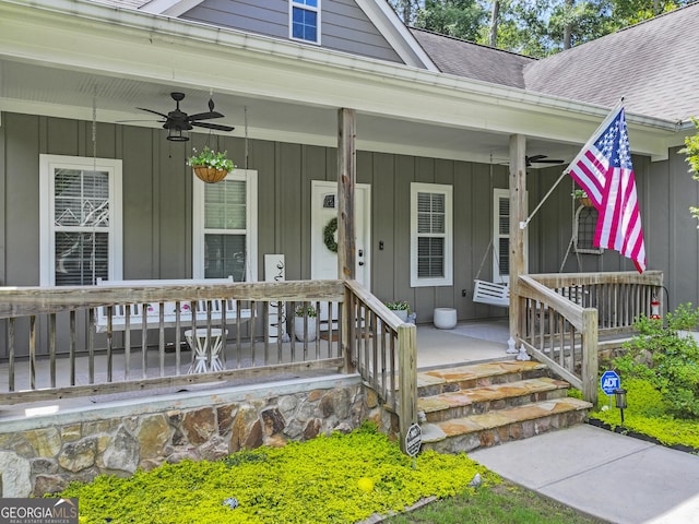 105 Crestview Dr, Jefferson, GA 30549 - property entrance with covered porch, board and batten siding, a ceiling fan, and roof with shingles