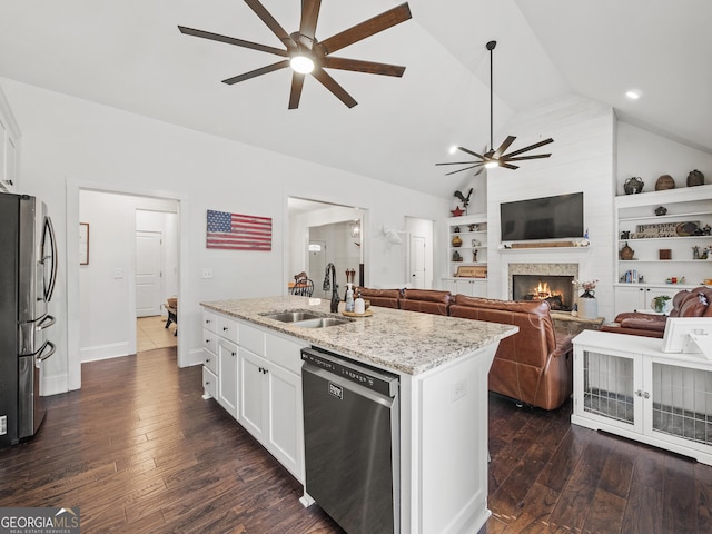 105 Crestview Dr, Jefferson, GA 30549 - kitchen featuring stainless steel appliances, ceiling fan, an island with sink, dark wood-style flooring, and lofted ceiling