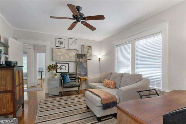 1300 N Ave NE, Atlanta, GA 30307 - living area featuring a ceiling fan, light wood-style floors, and ornamental molding