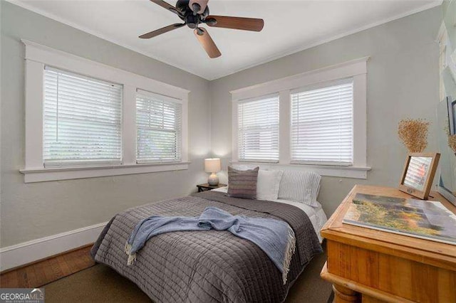 1300 N Ave NE, Atlanta, GA 30307 - bedroom with wood finished floors, crown molding, and a ceiling fan
