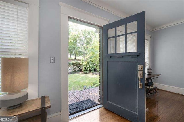 1300 N Ave NE, Atlanta, GA 30307 - entrance foyer featuring wood finished floors and crown molding