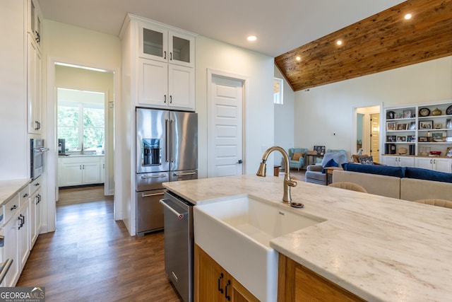 4384 Round Pond Rd, Lafayette, GA 30728 - kitchen with stainless steel appliances, lofted ceiling, dark wood finished floors, open floor plan, and glass insert cabinets