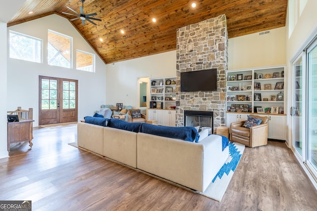 4384 Round Pond Rd, Lafayette, GA 30728 - living area featuring high vaulted ceiling, a fireplace, a ceiling fan, wood ceiling, and wood finished floors