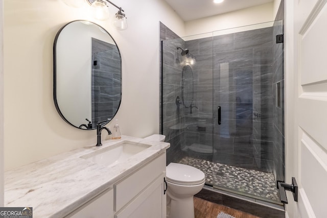 4384 Round Pond Rd, Lafayette, GA 30728 - bathroom with vanity, a shower stall, and wood finished floors