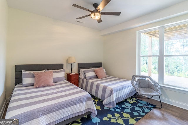 4384 Round Pond Rd, Lafayette, GA 30728 - bedroom featuring multiple windows, wood finished floors, and a ceiling fan