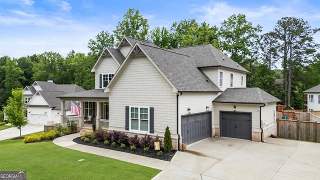 4395 Capstone Ct, Roswell, GA 30075 - view of front of home with roof with shingles, concrete driveway, an attached garage, and a porch
