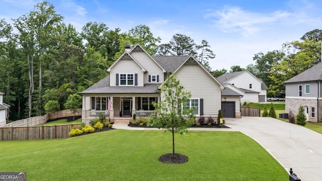 4395 Capstone Ct, Roswell, GA 30075 - craftsman inspired home with a porch, driveway, a garage, and a shingled roof