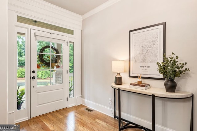 4395 Capstone Ct, Roswell, GA 30075 - entryway with light wood-style flooring and crown molding