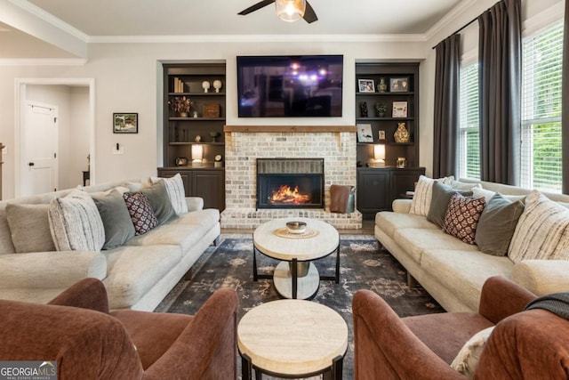 4395 Capstone Ct, Roswell, GA 30075 - living area featuring a ceiling fan, crown molding, a brick fireplace, and built in features