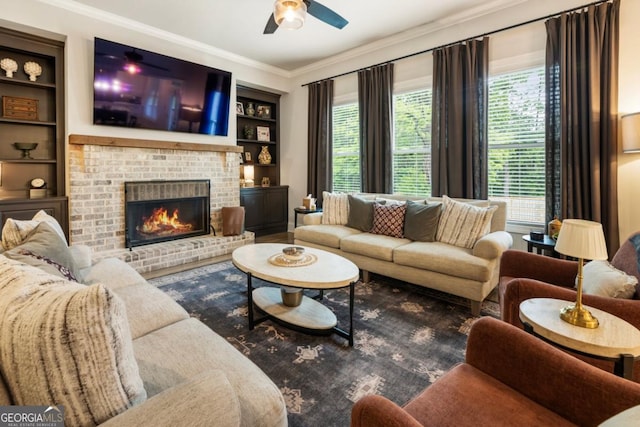 4395 Capstone Ct, Roswell, GA 30075 - living room featuring ceiling fan, crown molding, a fireplace, and built in shelves